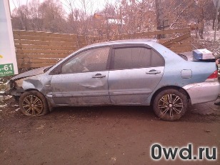 Битый автомобиль Mitsubishi Lancer